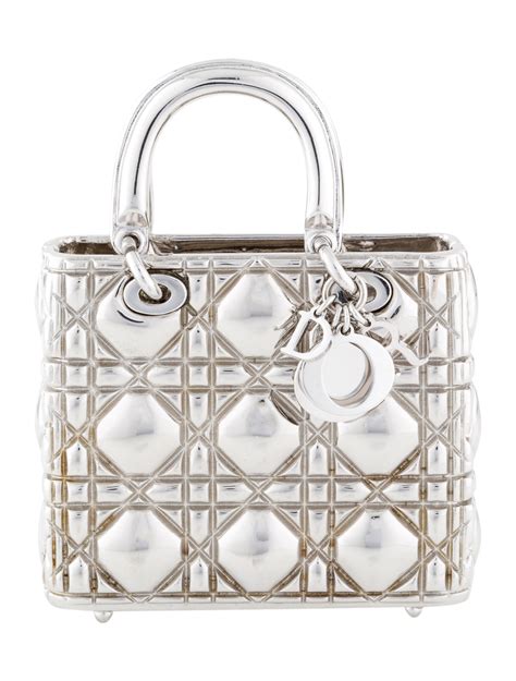 who owns the dior mirror bag|christian Dior acquisition.